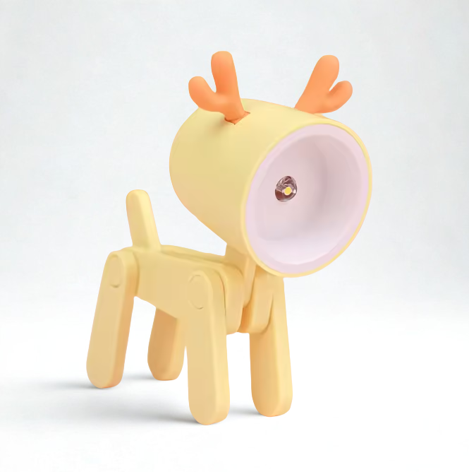 Yellow toy deer with a pink nose on a white background