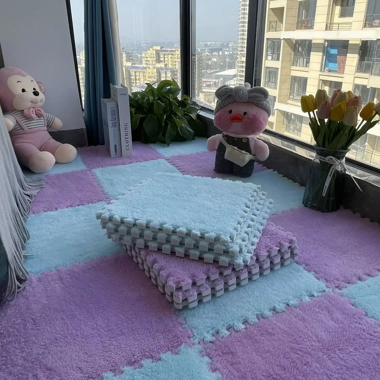 Checkerboard patterned fluffy carpet puzzle tiles displayed on a floor with a stuffed toy and decorative items in the background.