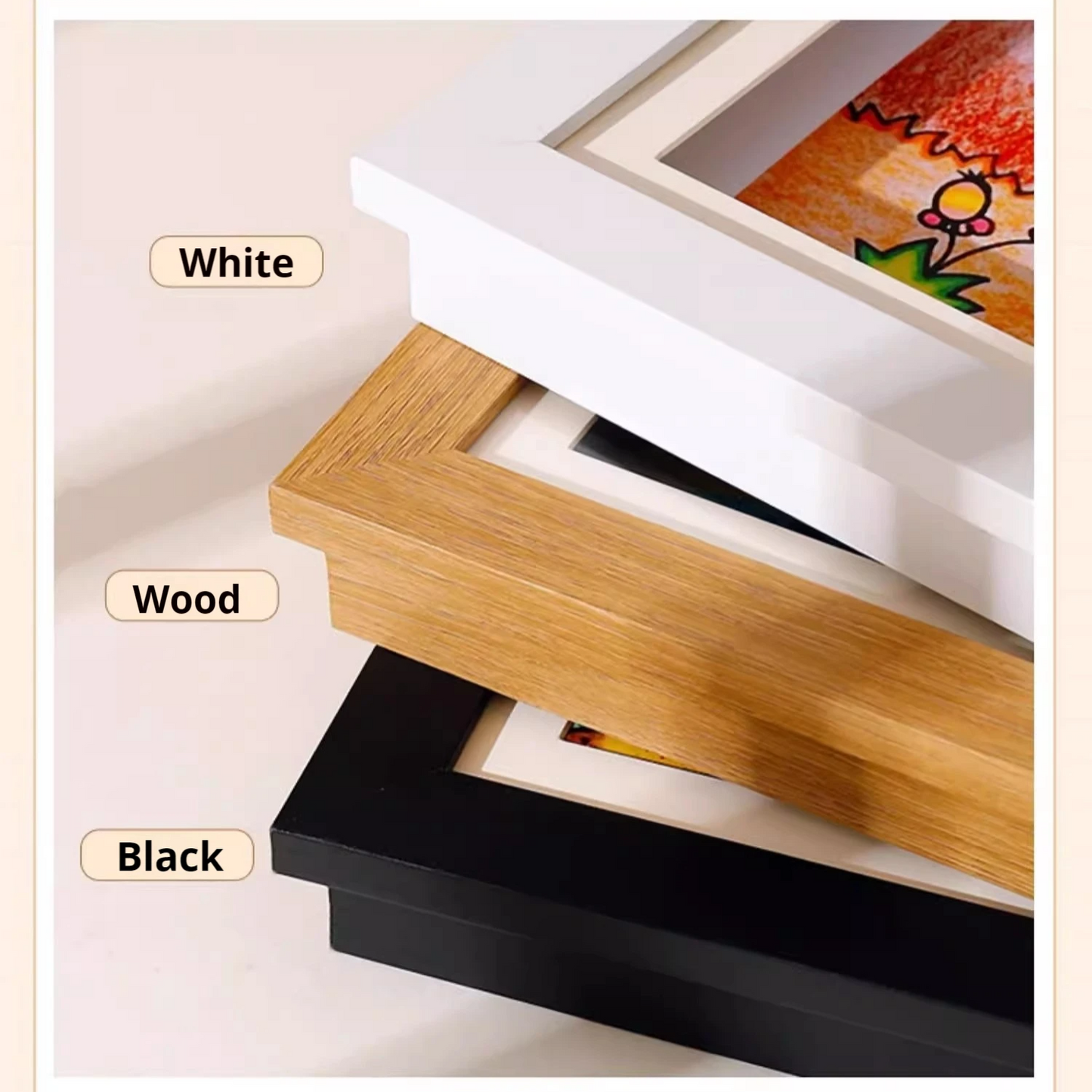 Three drawers labeled 'White', 'Wood', and 'Black' with a colorful painting on top.